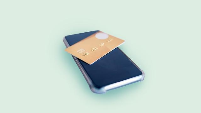 Credit card on top of mobile phone