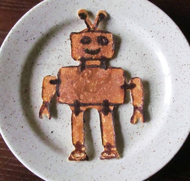A dessert on a plate in the shape of a robot