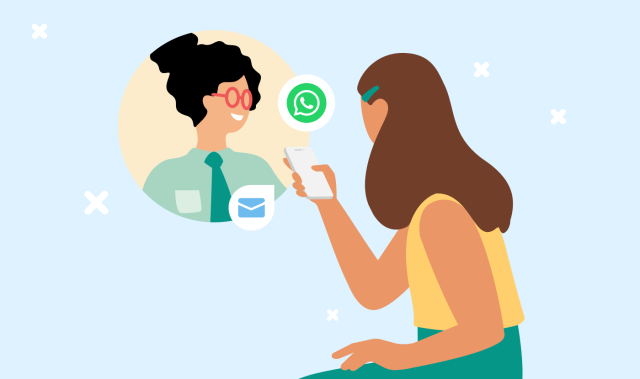 Woman looking at her phone and chatting to a business via WhatsApp Business API 