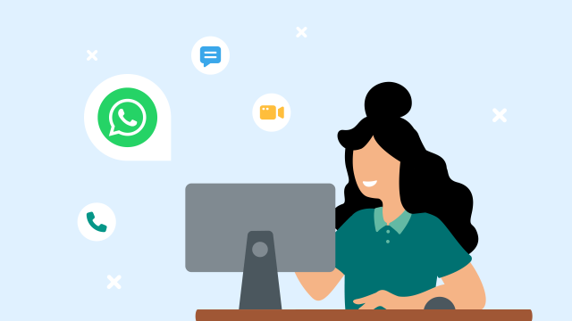 Woman looking at computer for whatsapp verification