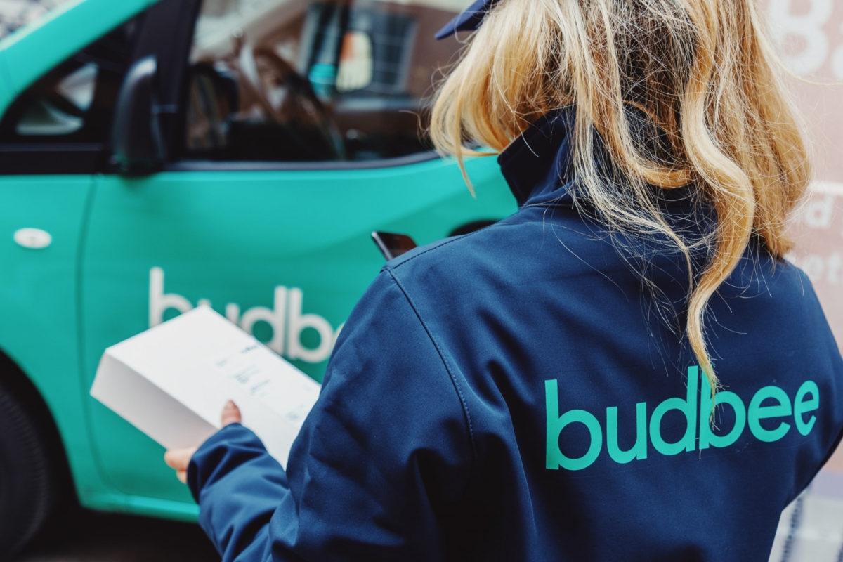 Image of budbee driver with logo on jacket