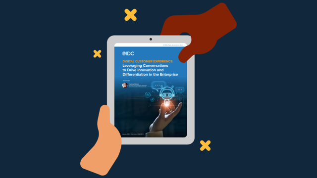 hands holding a tablet on the screen the cover of the IDC whitepaper